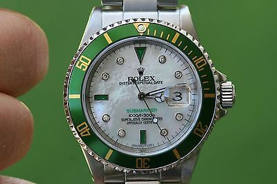 ROLEX MENS SUBMARINER STAINLESS STEEL GREEN BEZEL WHITE MOTHER OF PEARL  diamonds