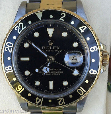 ROLEX GMT II TWO TONE 18k GOLD & STEEL WATCH BLACK 16713