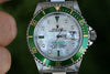 ROLEX MENS SUBMARINER STAINLESS STEEL GREEN BEZEL WHITE MOTHER OF PEARL diamonds