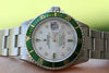 ROLEX MENS SUBMARINER STAINLESS STEEL GREEN BEZEL WHITE MOTHER OF PEARL diamonds