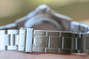 ROLEX MENS SUBMARINER STAINLESS STEEL GREEN BEZEL WHITE MOTHER OF PEARL diamonds