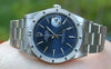 ROLEX MENS STAINLESS STEEL DATE BLUE DIAL