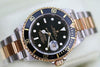 ROLEX SUBMARINER TWO TONE GOLD STAINLESS STEEL BLACK ON BLACK WATCH 16613