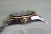 ROLEX SUBMARINER TWO TONE GOLD STAINLESS STEEL BLACK ON BLACK WATCH 16613